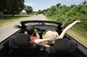 Couple Driving In Convertible Photo, Auto Insurance, Yardley - Fidishun Insurance & Financial Inc.